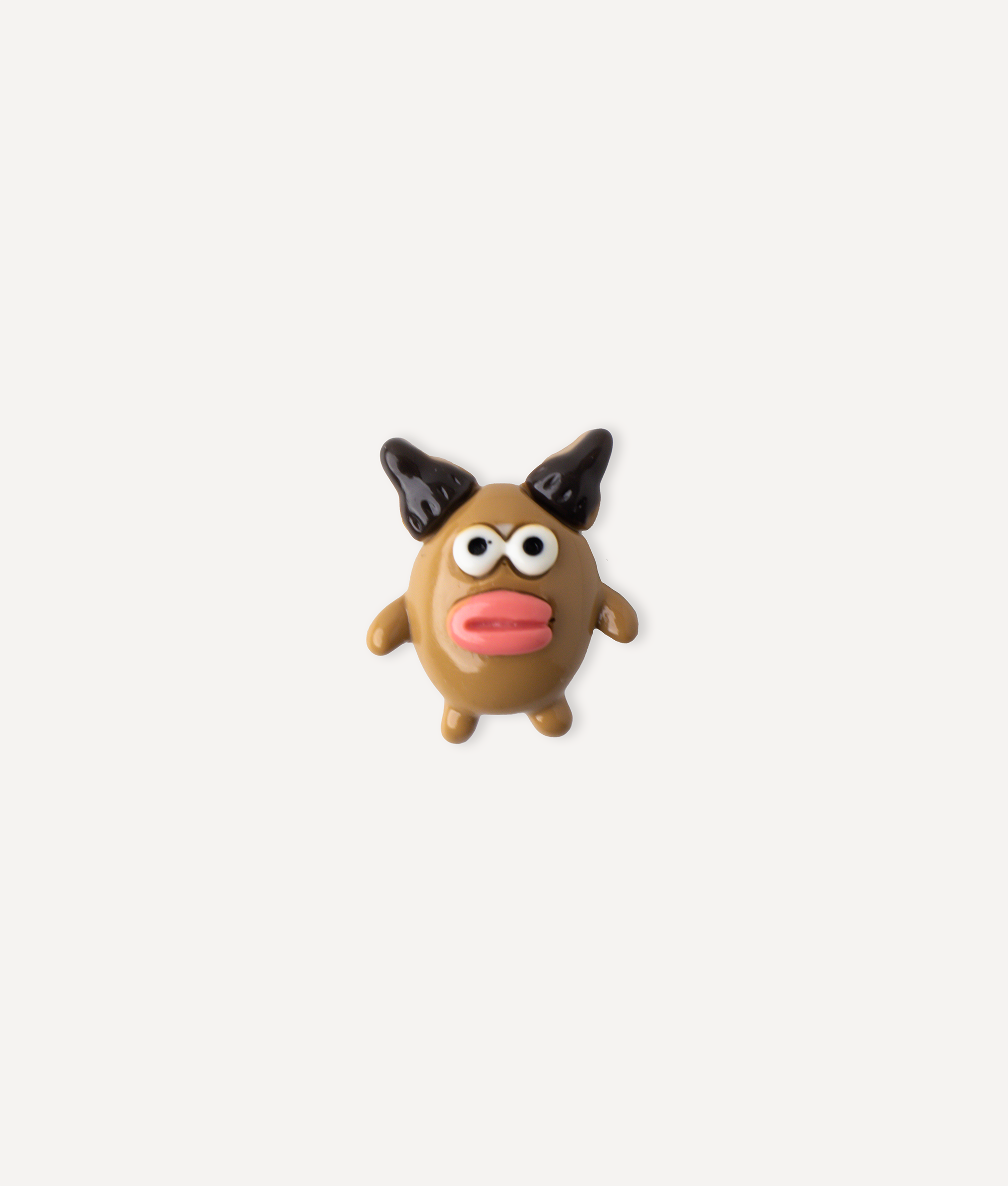 BROWN MONSTER PIN